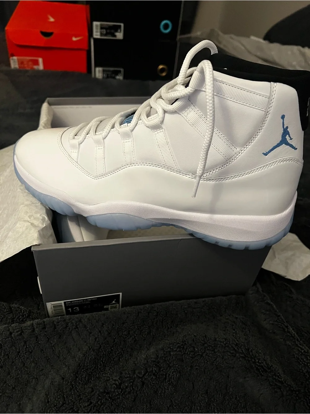 Jordan 11 Retro Men’s White/Icy Blue High-Top Sneakers